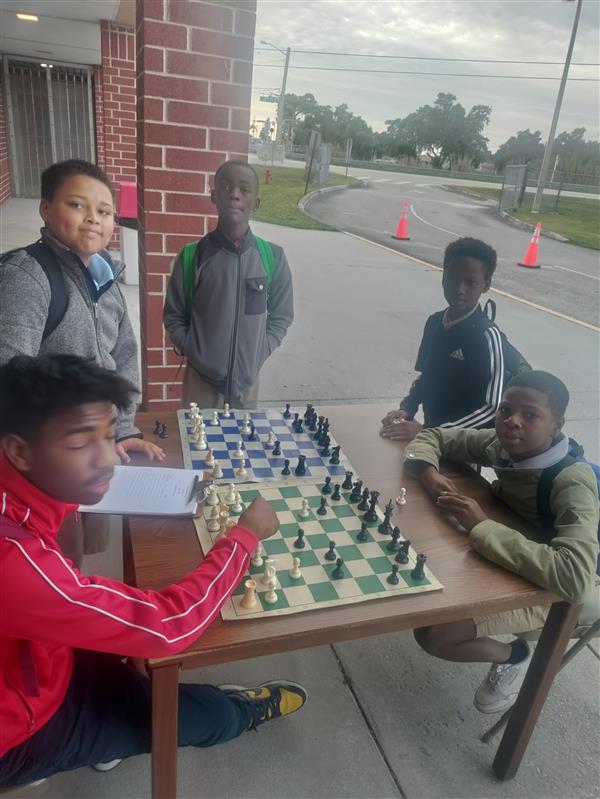 Eugene, Wikens, Edward, Odensley, and Xavier are members of the Chess Club
